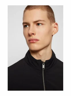 Deean-taskuun pakattava takki